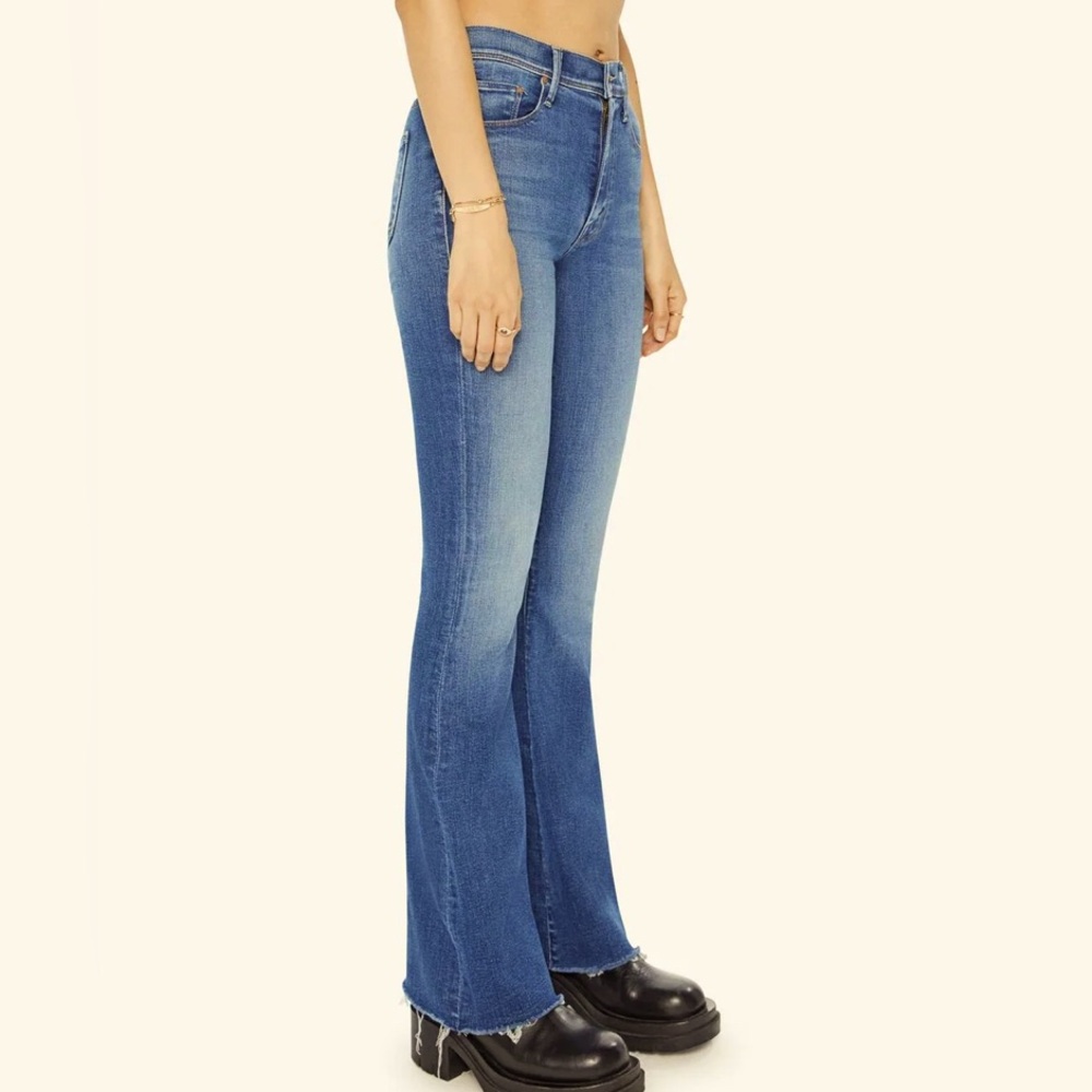Mother flare denim with ripped knee